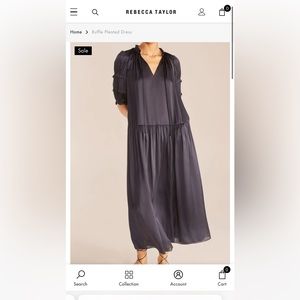 ruffle-trimmed pleated sleeves balance out the relaxed silhouette and drop waist